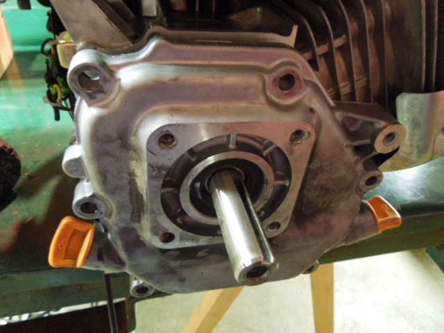 Image of: output shaft with bolts removed, mallet tapped to remove