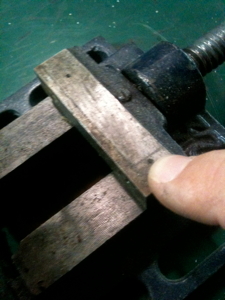 Next I drilled some holes in the vise