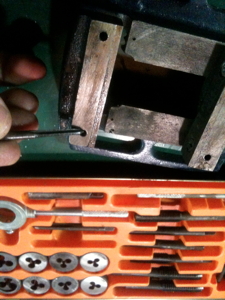tapping the holes for screws I found